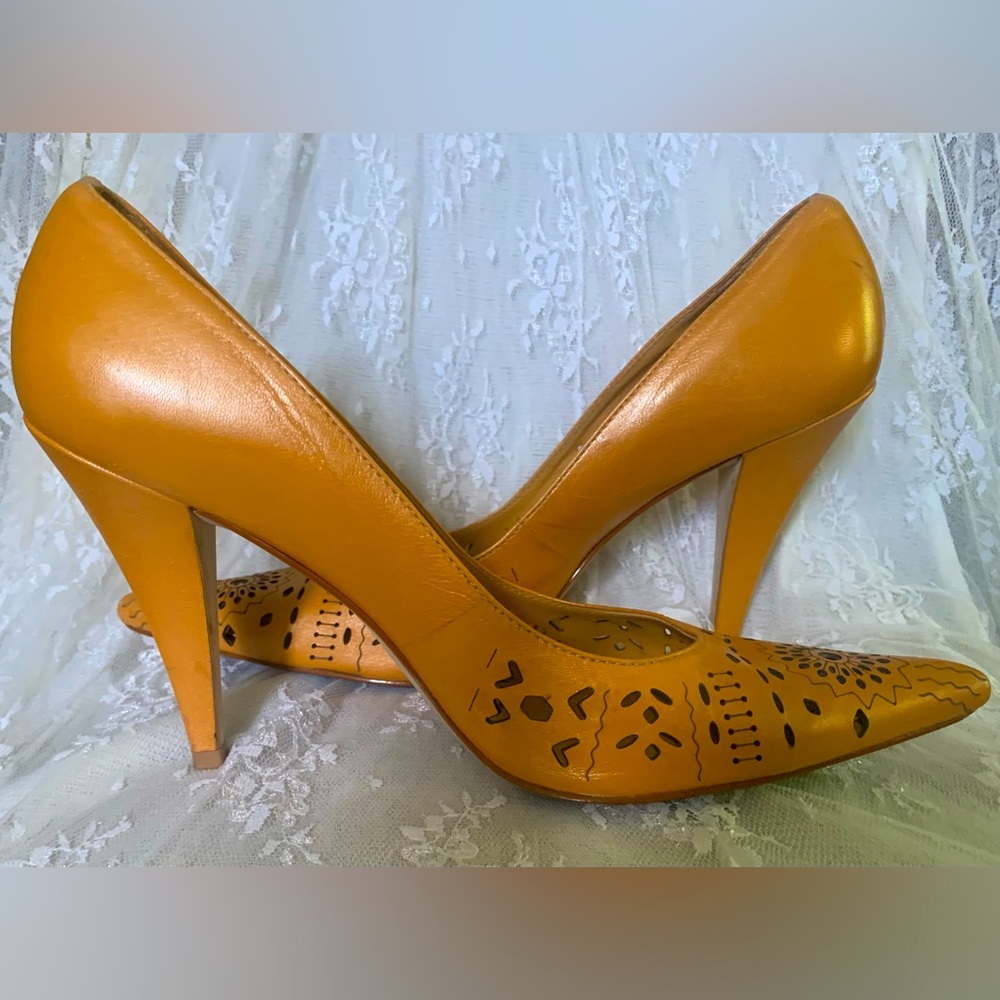 BCBGIRLS pointed toe stilettos.